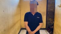 Terduga pelaku setelah diamankan aparat kepolisian.