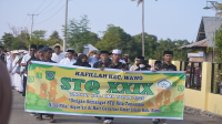 Penampilan salah satu kafilah saat pawai taaruf STQ ke-29 Kabupaten Bima di Kecamatan Lambu Kabupaten Bima, Sabtu (9/11/2024).