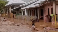 Luapan banjir di Kota Bima beberapa hari lalu. Foto Ilustrasi.