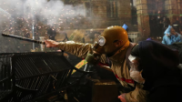 A demonstrator uses fireworks during a protest in Tbilisi, Georgia, December 1, 2024. Photo Reuters.