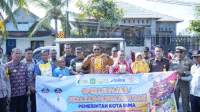 Tim Pengendalian Inflasi Daerah (TPID) Kota Bima saat menggelar operasi pasar gerakan pangan murah dalam rangka pengendalian inflasi daerah dan stabilisasi harga pangan, di kantor Kelurahan Melayu Kota Bima, Kamis (31/7/2025).