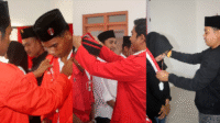 Suasana pelantikan tiga DPK GMNI di aula kampus STKIP Harapan Bima, Minggu (28/9/2025).