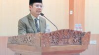 Bupati Dompu, Bambang Firdaus saat menyampaikan LKPJ Tahun 2025 dalam sidang paripurna DPRD Kabupaten Dompu.