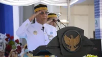 Wali Kota Bima Rahman H. Abidin saat memimpin upacara HUT ke-24 Kota Bima. Wali Kota Bima Rahman H. Abidin saat memimpin upacara HUT ke-24 Kota Bima.