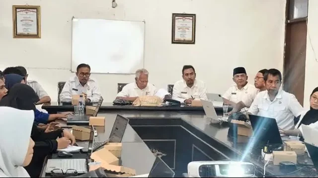 Suasana Rapat Koordinasi (Rakor) Penerapan dan Evaluasi SPM Perangkat Daerah Pemangku SPM di Ruang Rapat Bima Bermartabat, Kantor Bappeda Kabupaten Bima, Rabu (7/10/2026).