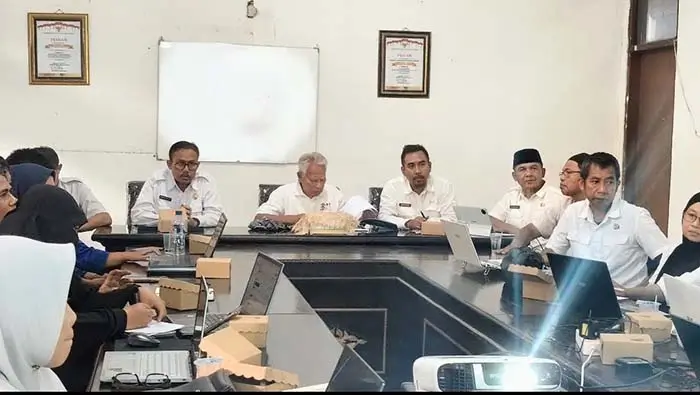 Suasana Rapat Koordinasi (Rakor) Penerapan dan Evaluasi SPM Perangkat Daerah Pemangku SPM di Ruang Rapat Bima Bermartabat, Kantor Bappeda Kabupaten Bima, Rabu (7/10/2026).